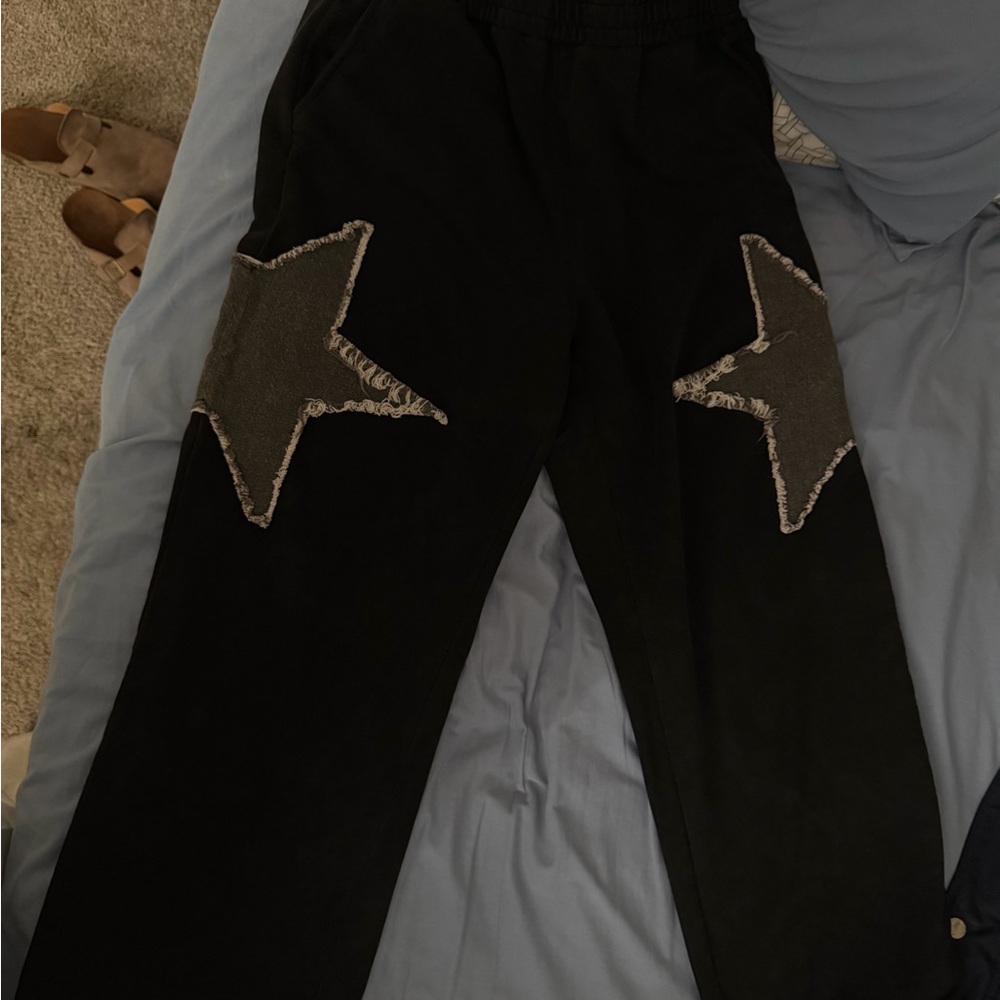 Black Pants with Star Patches